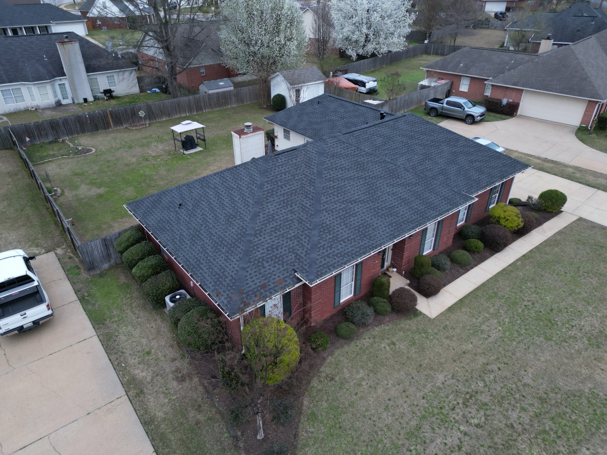 After: new GAF Timberline HDZ Charcoal shingle roof installed by Craftsman Roofing LLC in Tuscaloosa