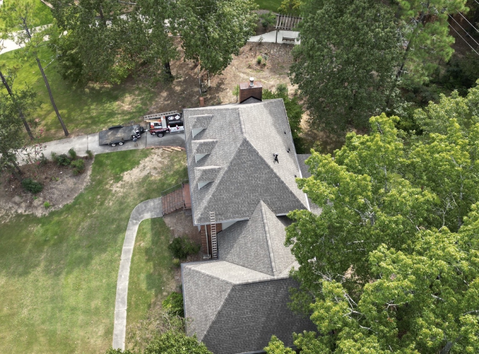 Shingle roof installation in progress on a Birmingham home