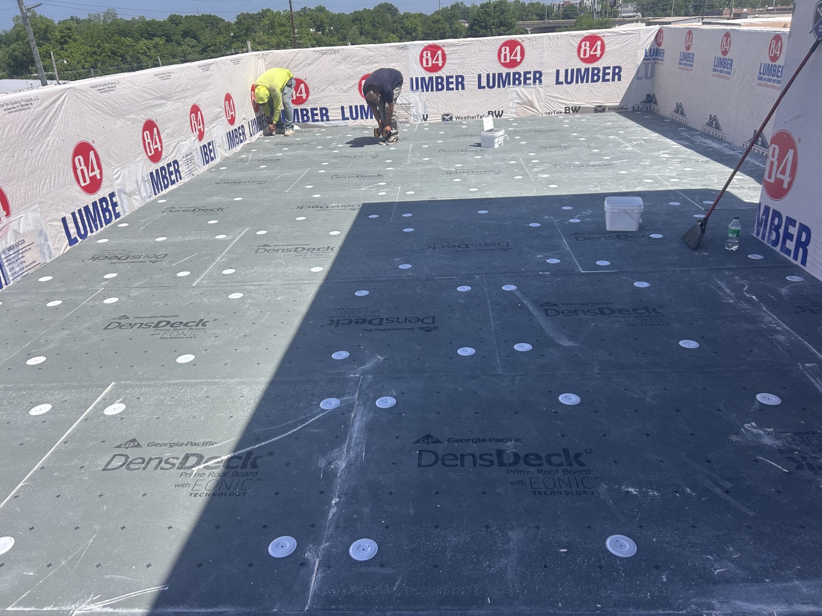 New construction roof with DensDeck cover board installation