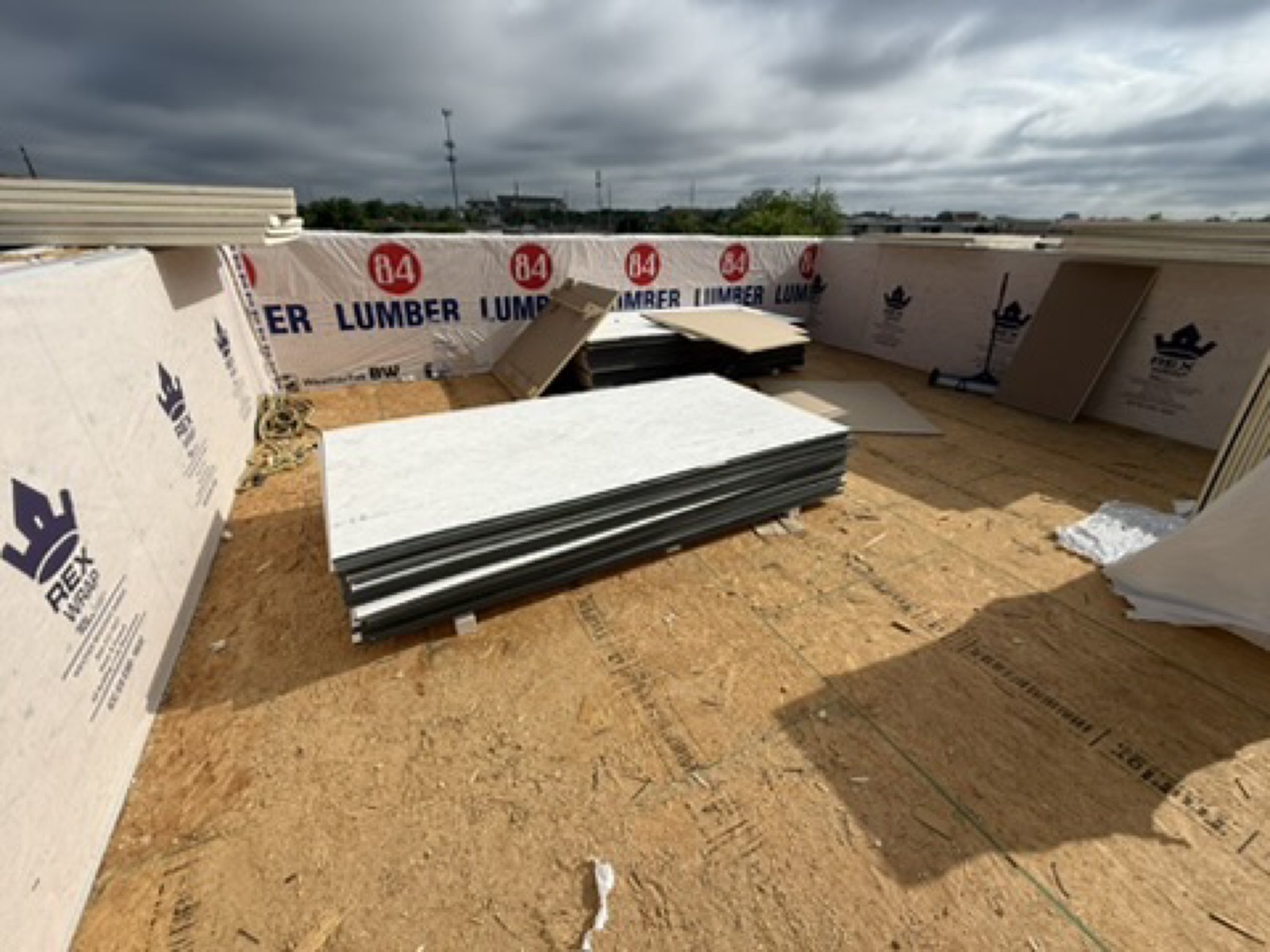Roof build-up and framing on a Tuscaloosa project